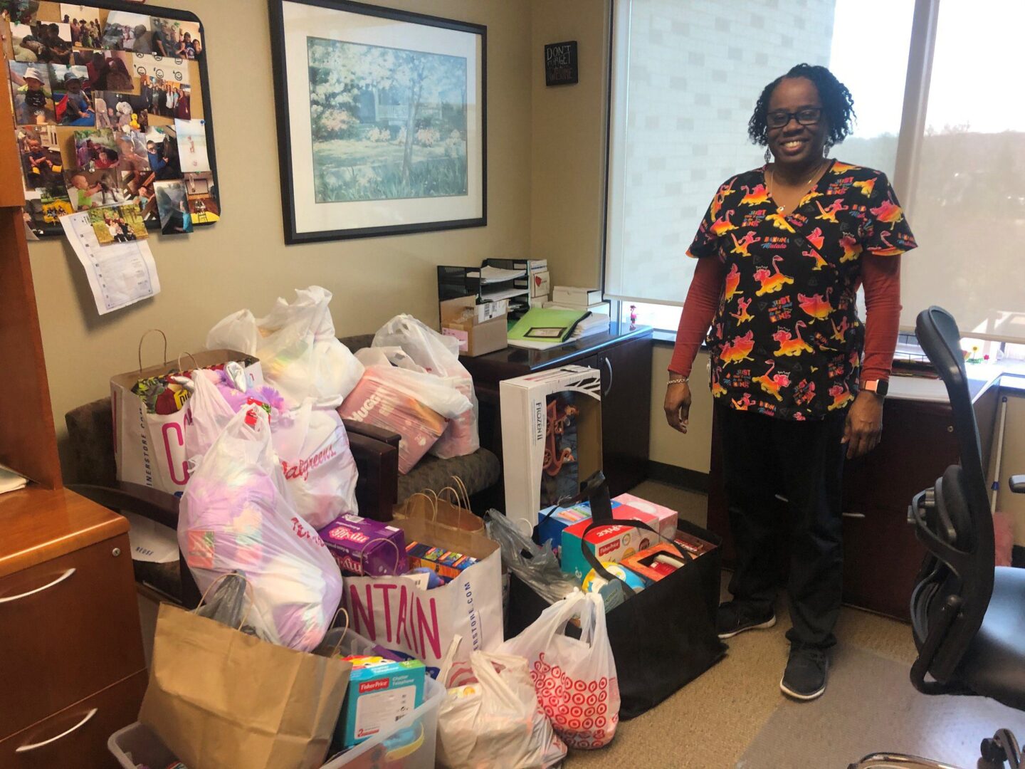 Posing with donations to Teen Parent Connection